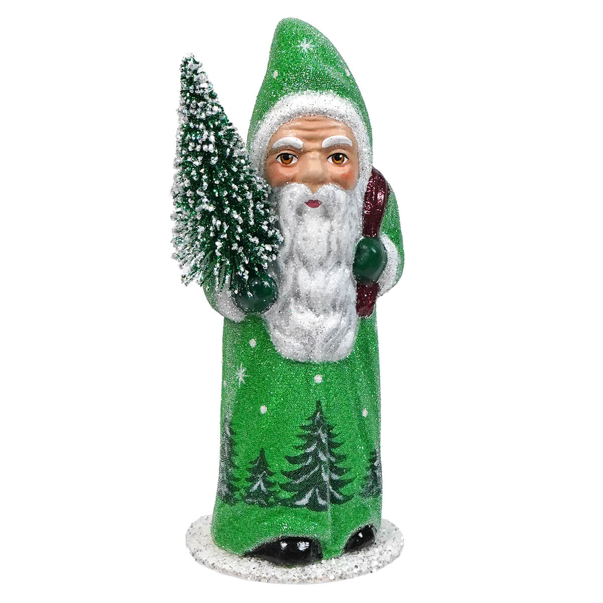 Green-robed Santa Claus figurine holding a miniature Christmas tree.