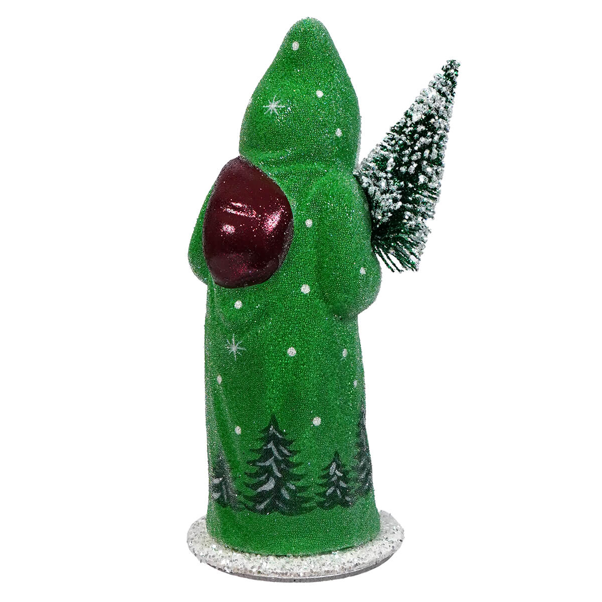 Green conical Christmas decoration with a red face and small pine trees painted on its body, accompanied by a miniature snowy tree.