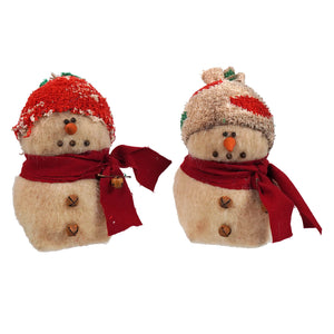 Two festive itty bitty snowman figurines wearing red knitted skicaps and scarves spreading holiday cheer