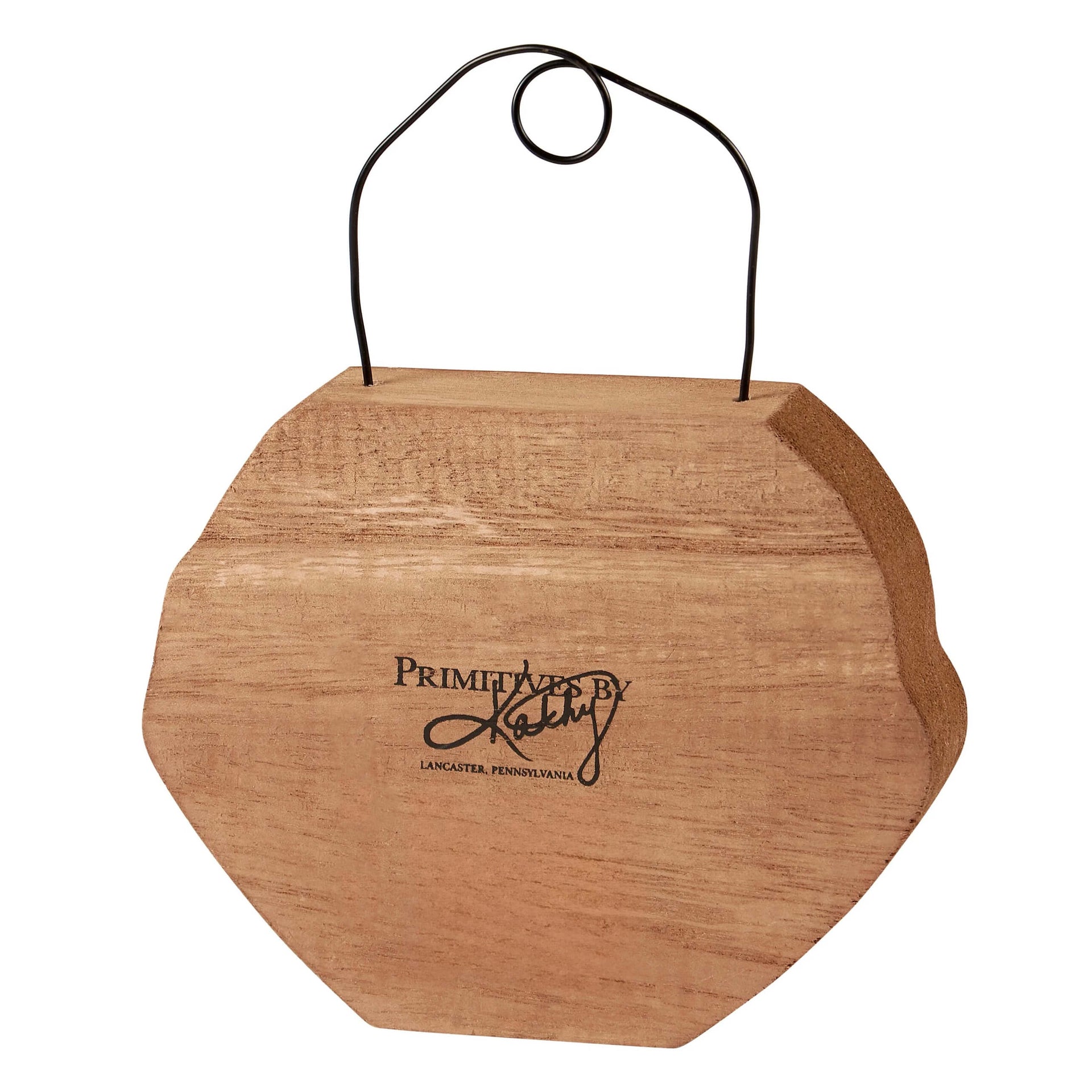 A light brown hexagonal wooden jack face chunky sitter with black wire loop handle and primitives by kathy branding