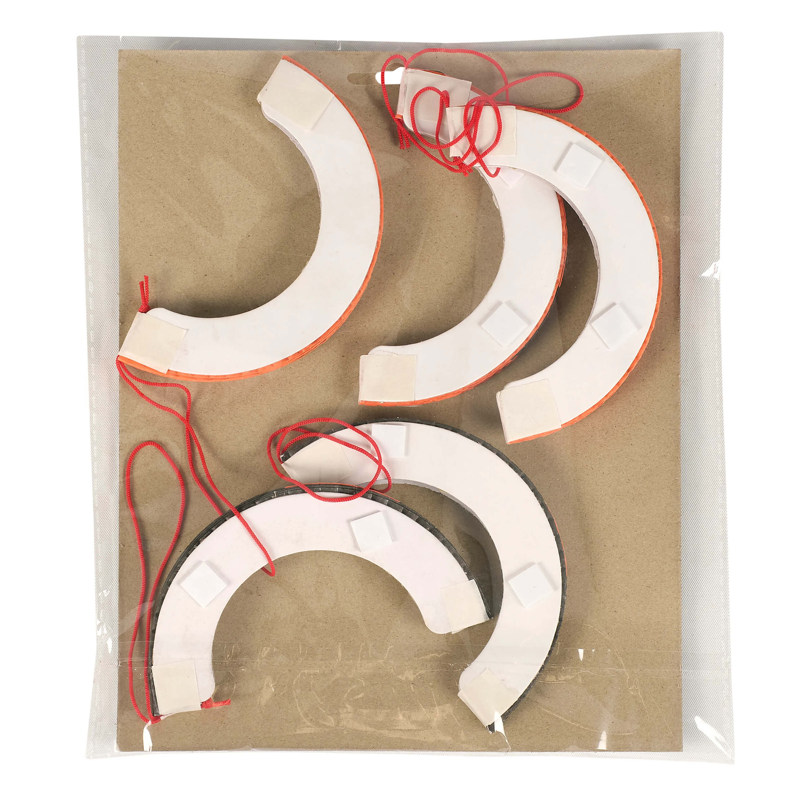 White and orange crescent-shaped paper jack-o-lantern accordian paper hanging halloween paper decorations set with red string ties