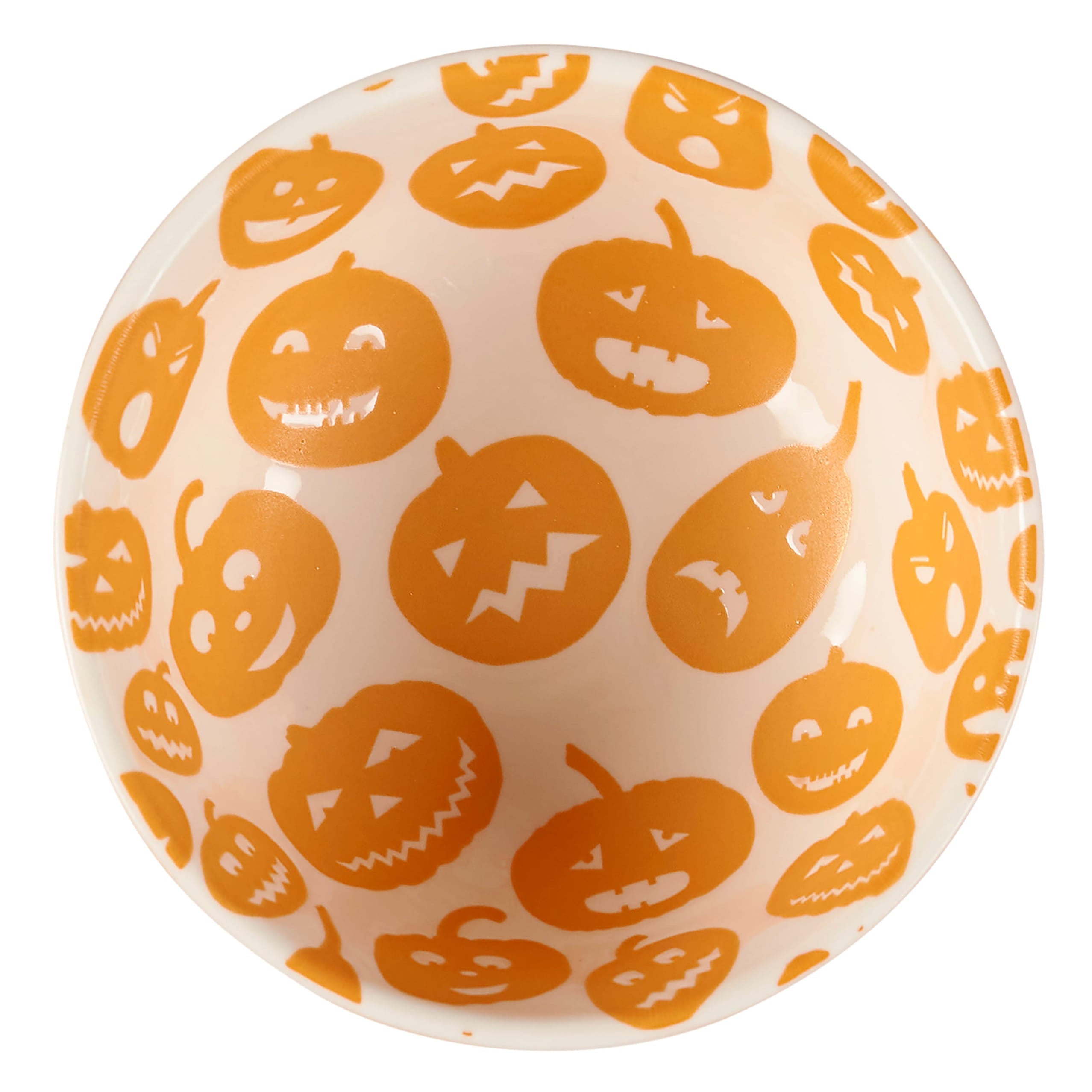 White ceramic jack o lantern bowl with playful orange pumpkin faces perfect for spooky bowl set collections