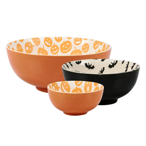 Set of three halloween-themed ceramic jack o’lantern bowl set in orange and black with pumpkin and bat designs inside