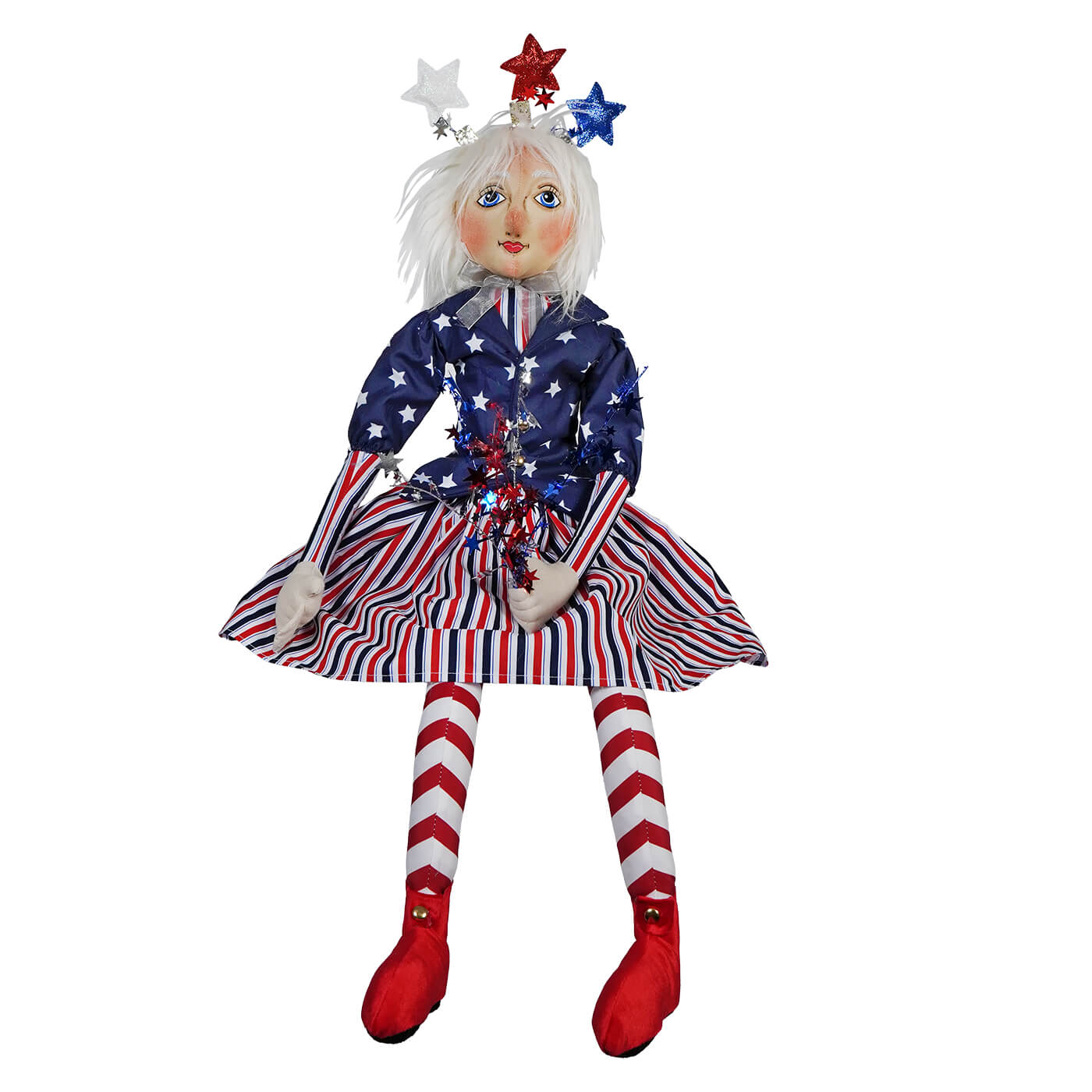 Patriotic cloth doll wearing stars and stripes with red and white striped stockings and red shoes.