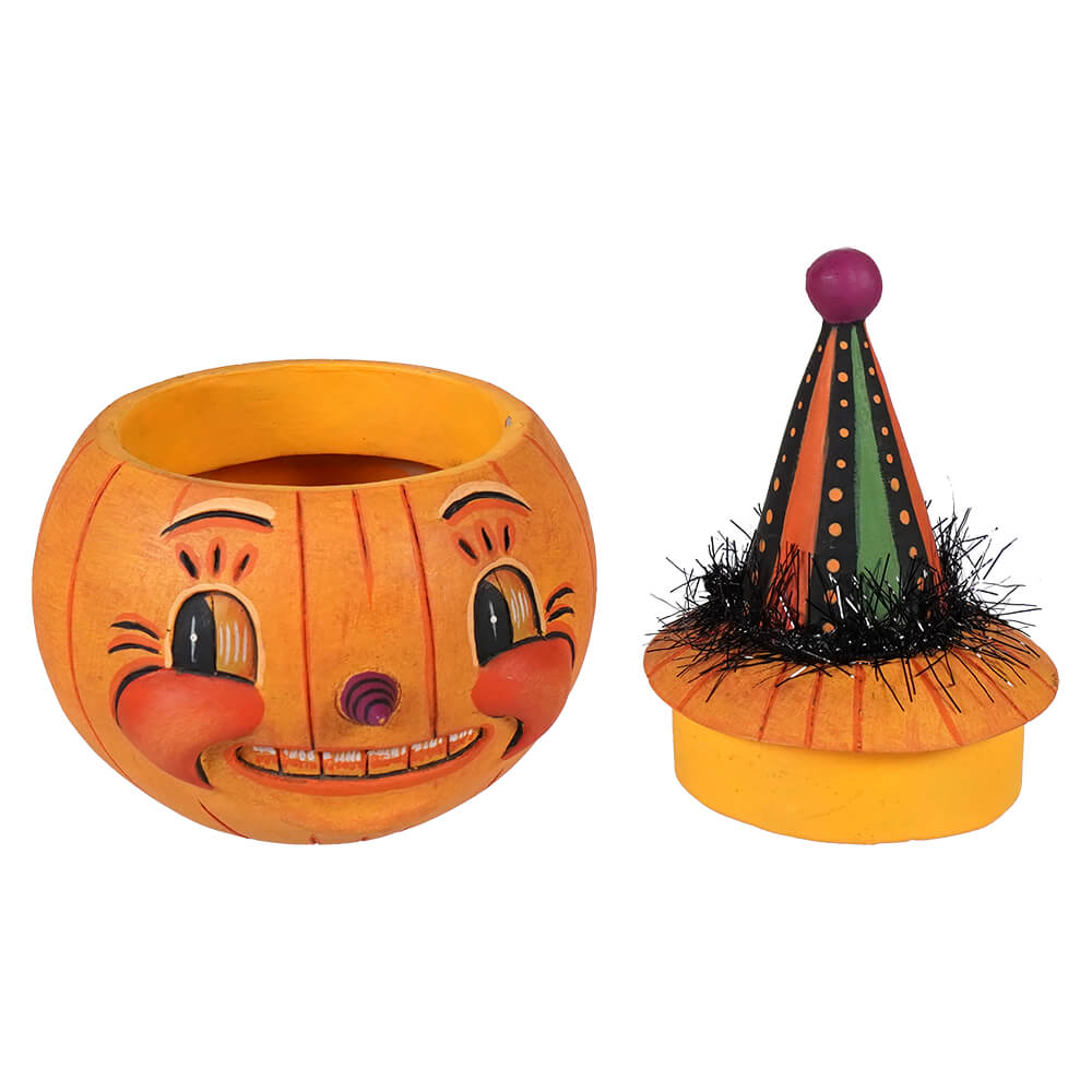 Orange pumpkin-shaped container with smiling face and clown hat lid for jackie yell-o-ween decor or treats
