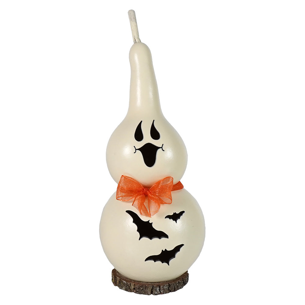 Cream-colored tiny ghost gourd candle with black face, orange bow, bat cutouts made from natural paper mache by meadowbrooke gourds