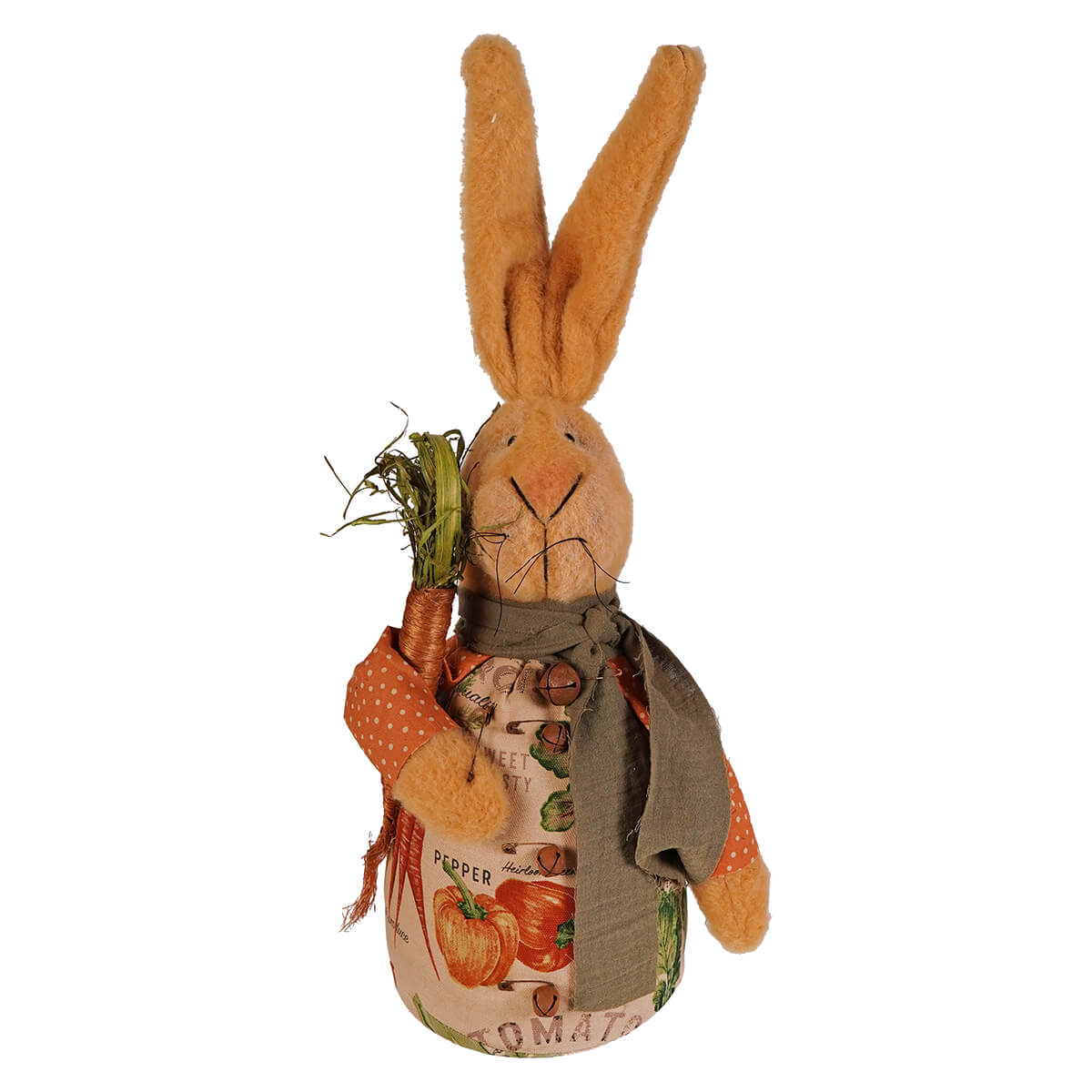 A charming tan fabric jeffrey rabbit holding carrot with long ears wearing orange polka dot apron and green scarf