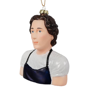 Glass ornament of jeremy allen white featuring a woman with dark curly hair in white blouse and shiny navy blue apron