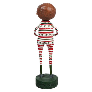 Holiday figurine wearing striped pajamas standing on a green base.