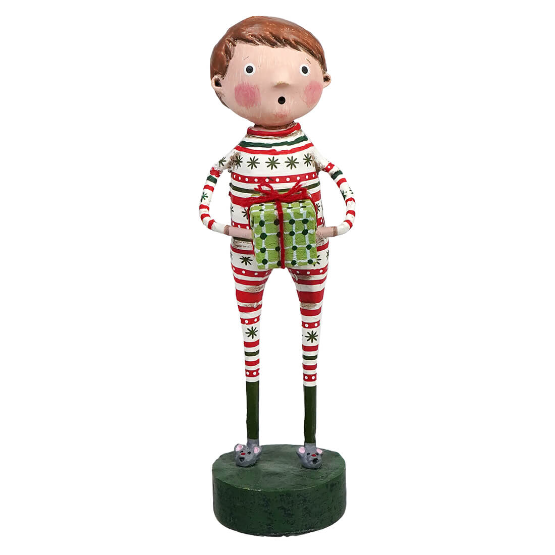 Whimsical holiday figurine wearing striped pajamas and holding a green gift box.