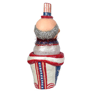 A johanna parker uncle sam container featuring a patriotic figurine with a silver beard and american flag patterns