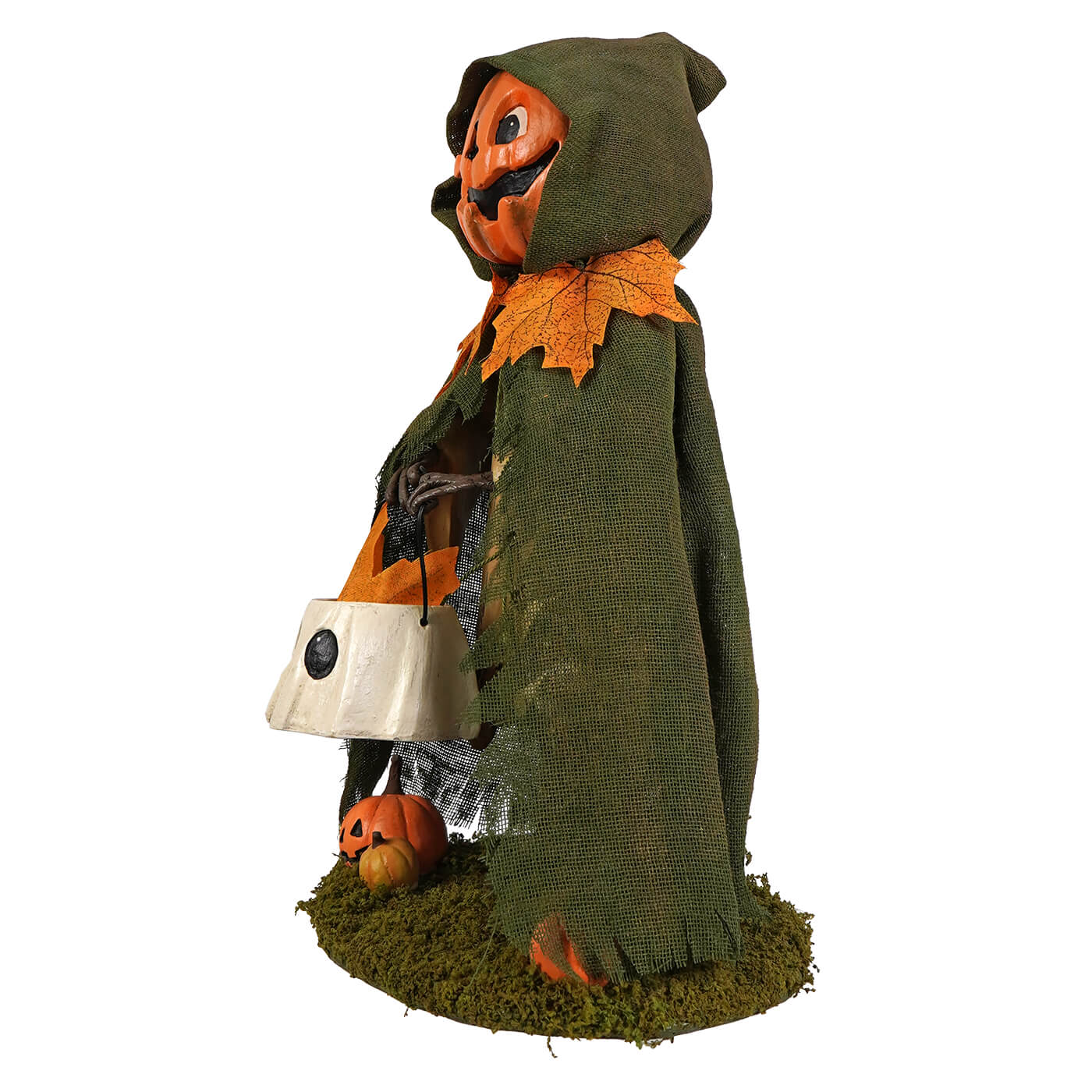 Jolly Jack Pumpkin halloween figural decor with orange pumpkin head and green burlap cloak made of autumn leaves