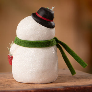 A charming white glittery snow boy figurine with black hat red band and green scarf by bethany lowe designs christmas snowman decor