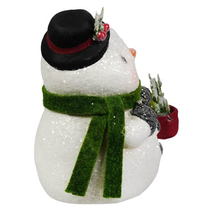 Jolly top hat snowboy glittery white snowman figure by bethany lowe designs with green scarf holding potted plant
