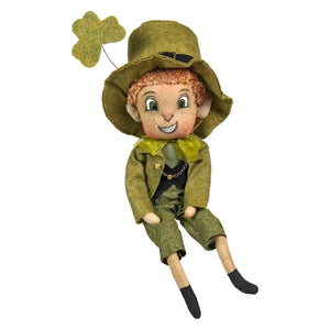 A keiran leprechaun plush doll by joe spencer with reddish curly hair green felt shamrock hat and matching green suit