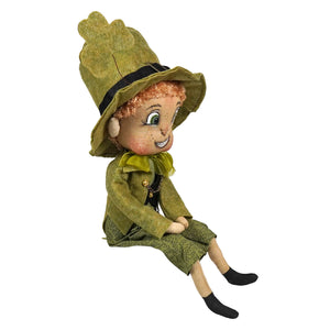 A charming olive green felt keiran leprechaun doll with a leaf hat and embroidered face by joe spencer