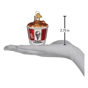 Kfc bucket of chicken christmas glass ornament with red and white stripes and golden fried chicken pieces on top