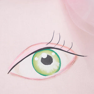 Koko zombinaland decorative pillow with a stylized green eye design painted on soft pink fabric by tracy scheff pillow