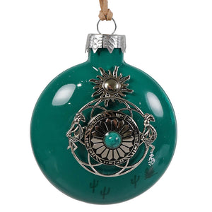 Emerald green glass kokopelli sunburst christmas ornament with silver sunburst and turquoise stone centerpiece by bette fraser day