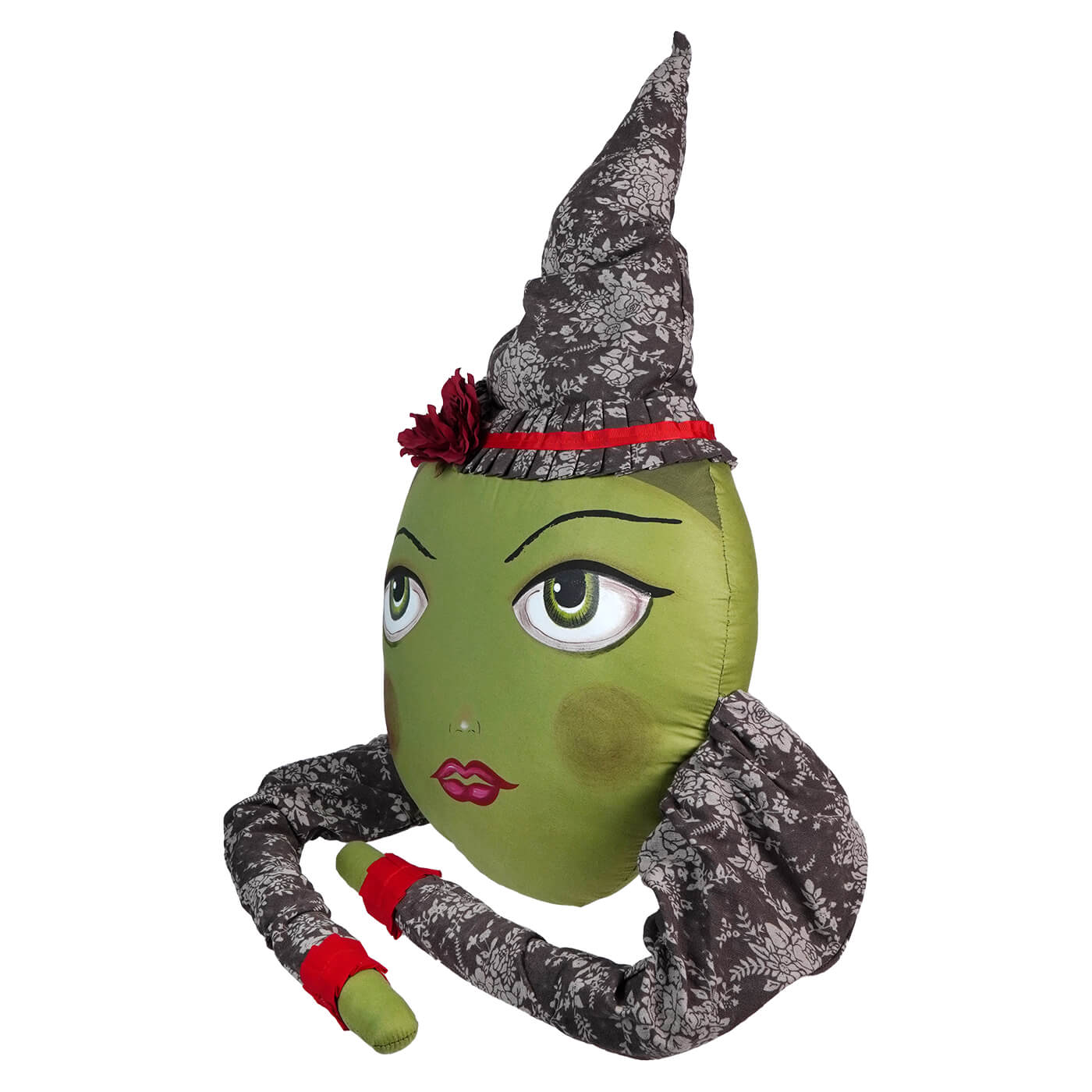 Green-faced witch head decoration with a pointed gray hat and red accents.