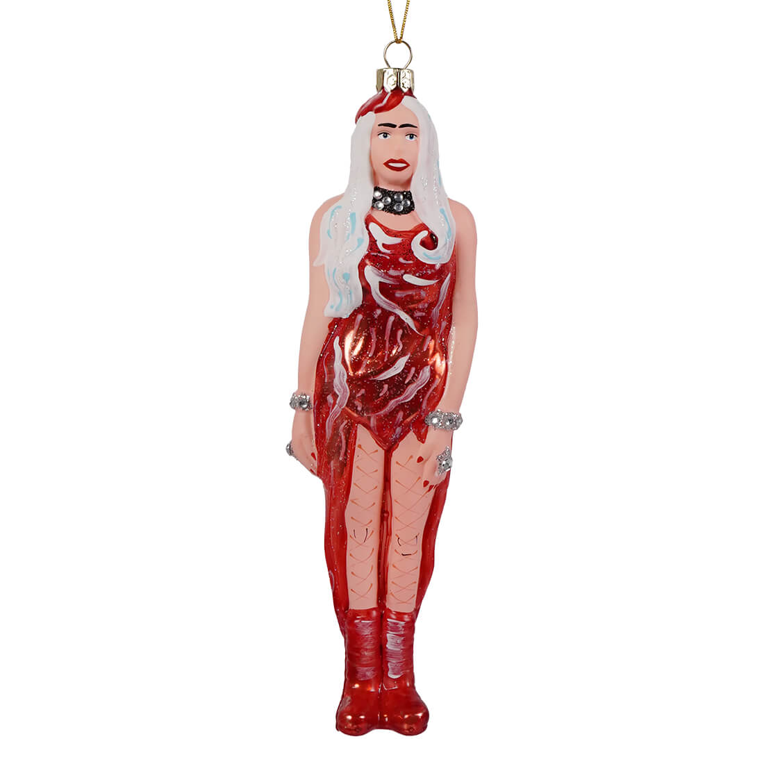 A translucent red glass ornament of lady gaga wearing a glittery red meat dress capturing pop culture style