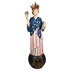 A painted resin bethany lowe lady liberty statue with american flag robe holding torch and liberty tablet figural decor