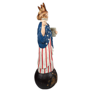 A bethany lowe lady liberty painted resin statue in an american flag gown holding liberty tablet and torch figural decor