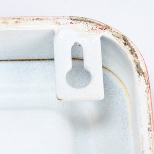 White enamel wall-mounted sleigh rides wall decor with chipped paint and keyhole slot for santa’s sleigh block hanging