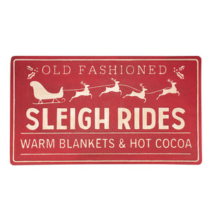 Red rectangular sleigh block sign with cream text and reindeer design saying old fashioned sleigh rides warm blankets hot cocoa