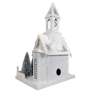 Large ivory church birdhouse by bethany lowe with white glitter, snow dusted roof, miniature pine trees, and light cord