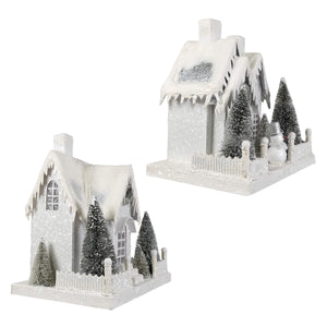 Large ivory cottages set 2 featuring a white glittery christmas cottage with snow roof and frosted pine trees winter white cottage