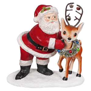 Large retro Santa with reindeer featuring red and white folk art Santa figure with fluffy beard and festive garland on reindeer