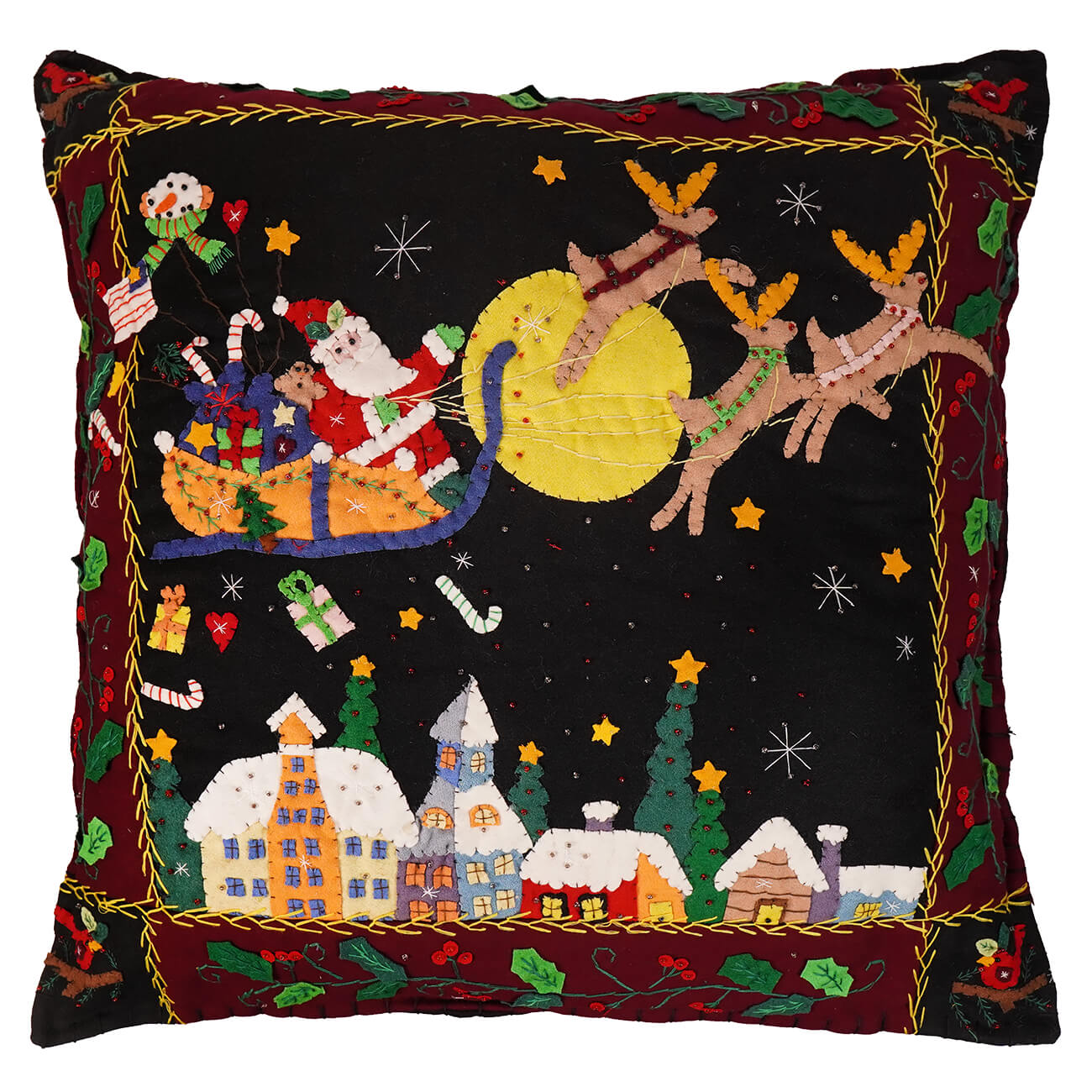 Black large santa flying rooftops pillow with hand stitched wool santa sleigh and reindeer over snow-covered houses