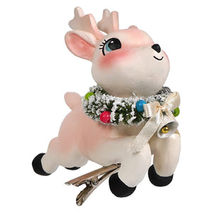 A charming pink ceramic leaping high reindeer clip-on ornament with festive garland and bell by bethany lowe designs