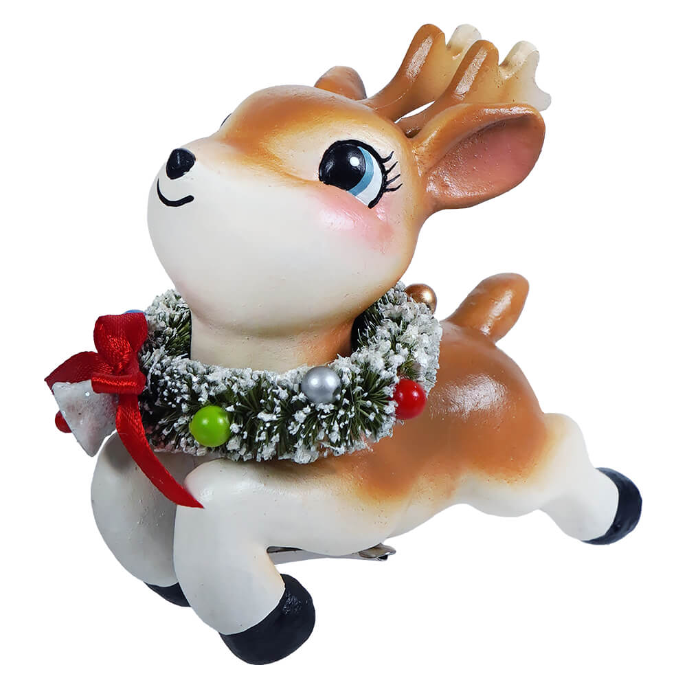 A charming tan and white leaping high reindeer clip-on ornament with a frosted wreath by bethany lowe designs