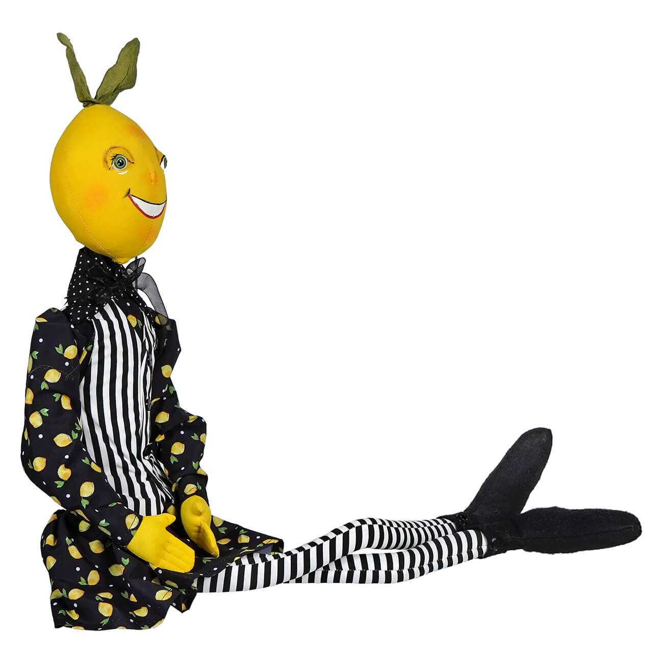 Whimsical plush doll with a lemon head wearing a black and white striped outfit with lemon print details.