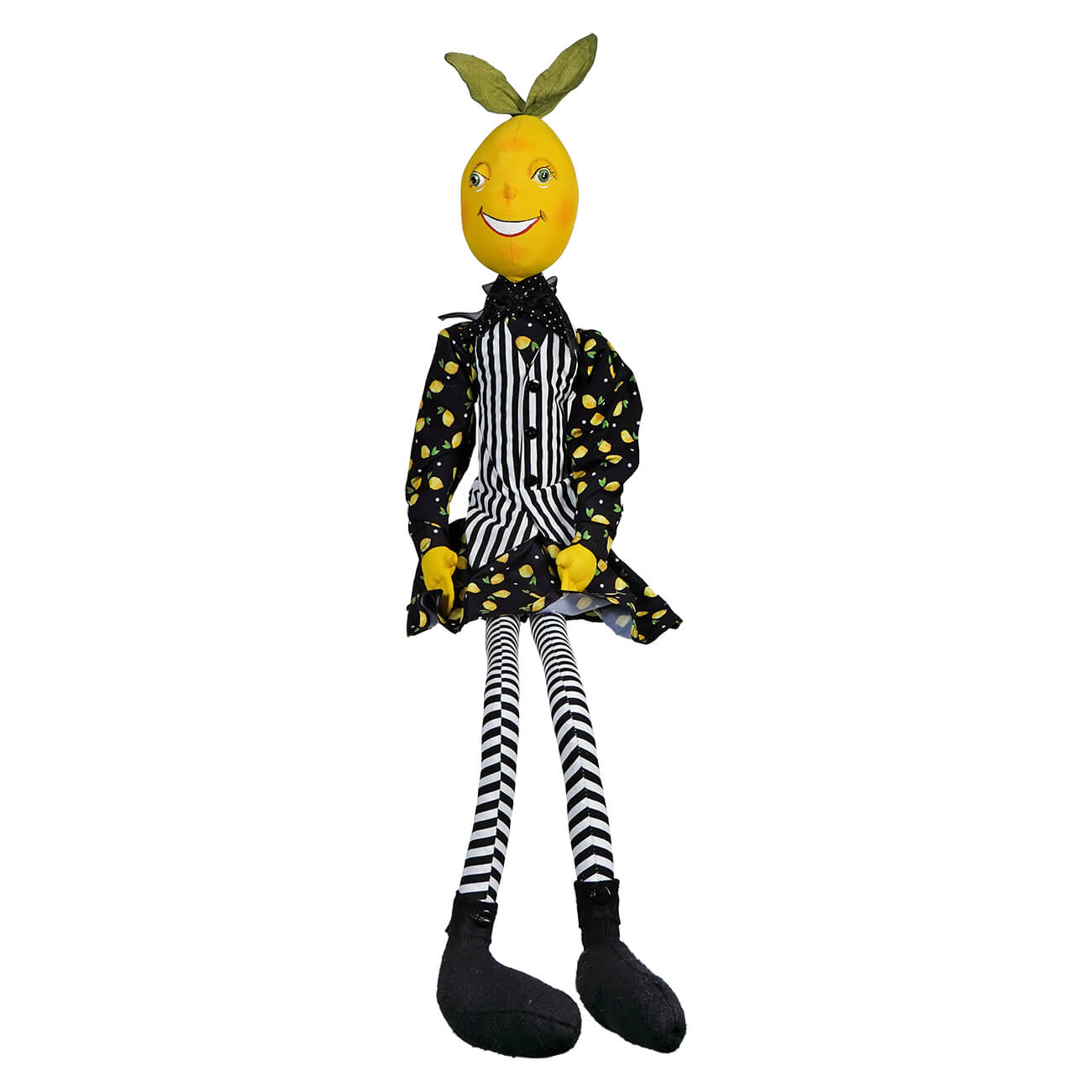 Whimsical plush doll with a lemon head wearing a striped dress and black floral jacket with dangling striped legs.