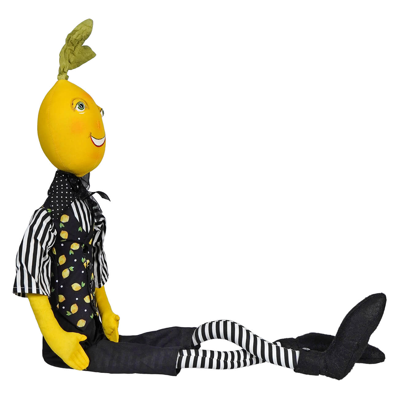 Whimsical lemon-headed doll wearing striped and polka dot clothing.