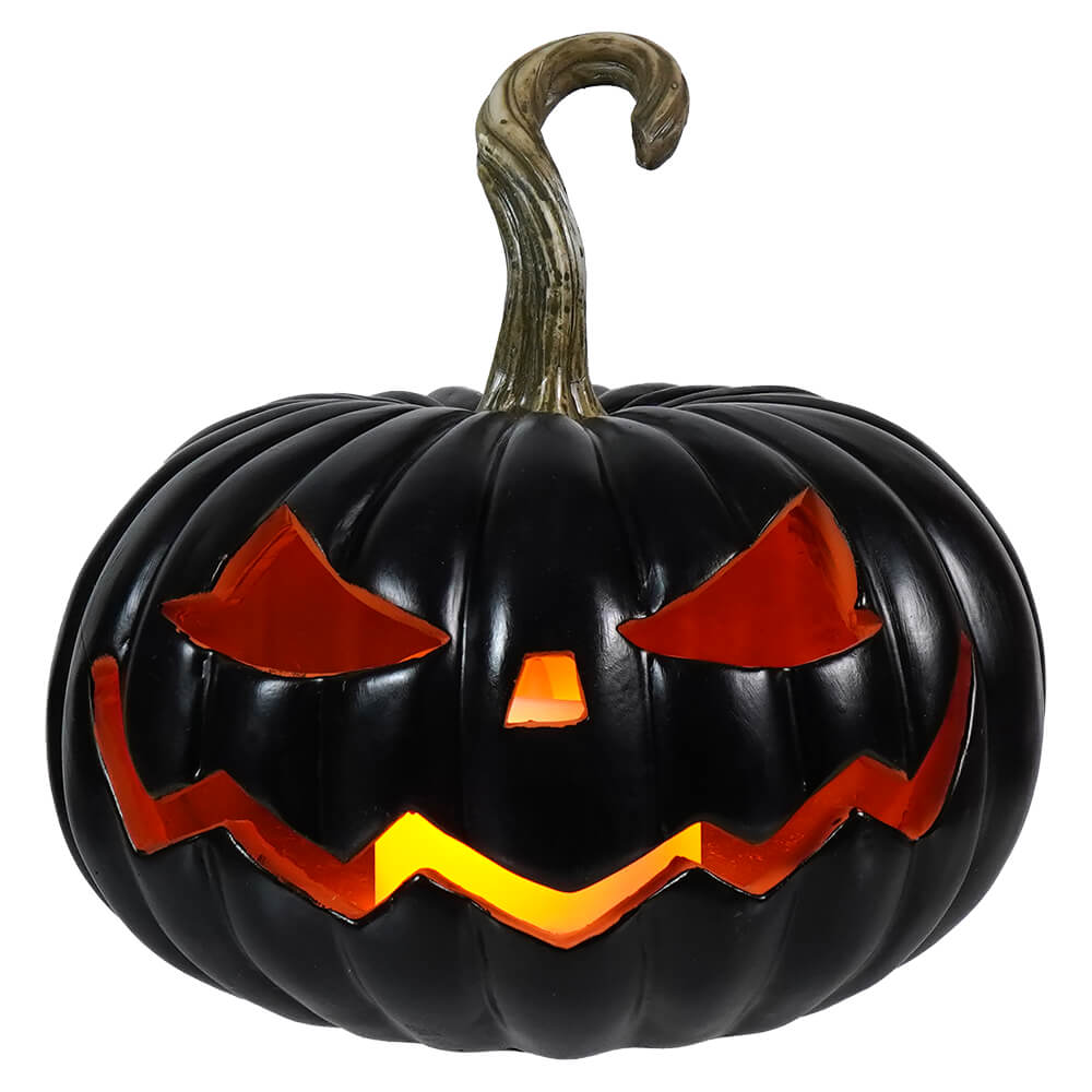 Black jack-o’-lantern with glowing red eyes and jagged mouth.