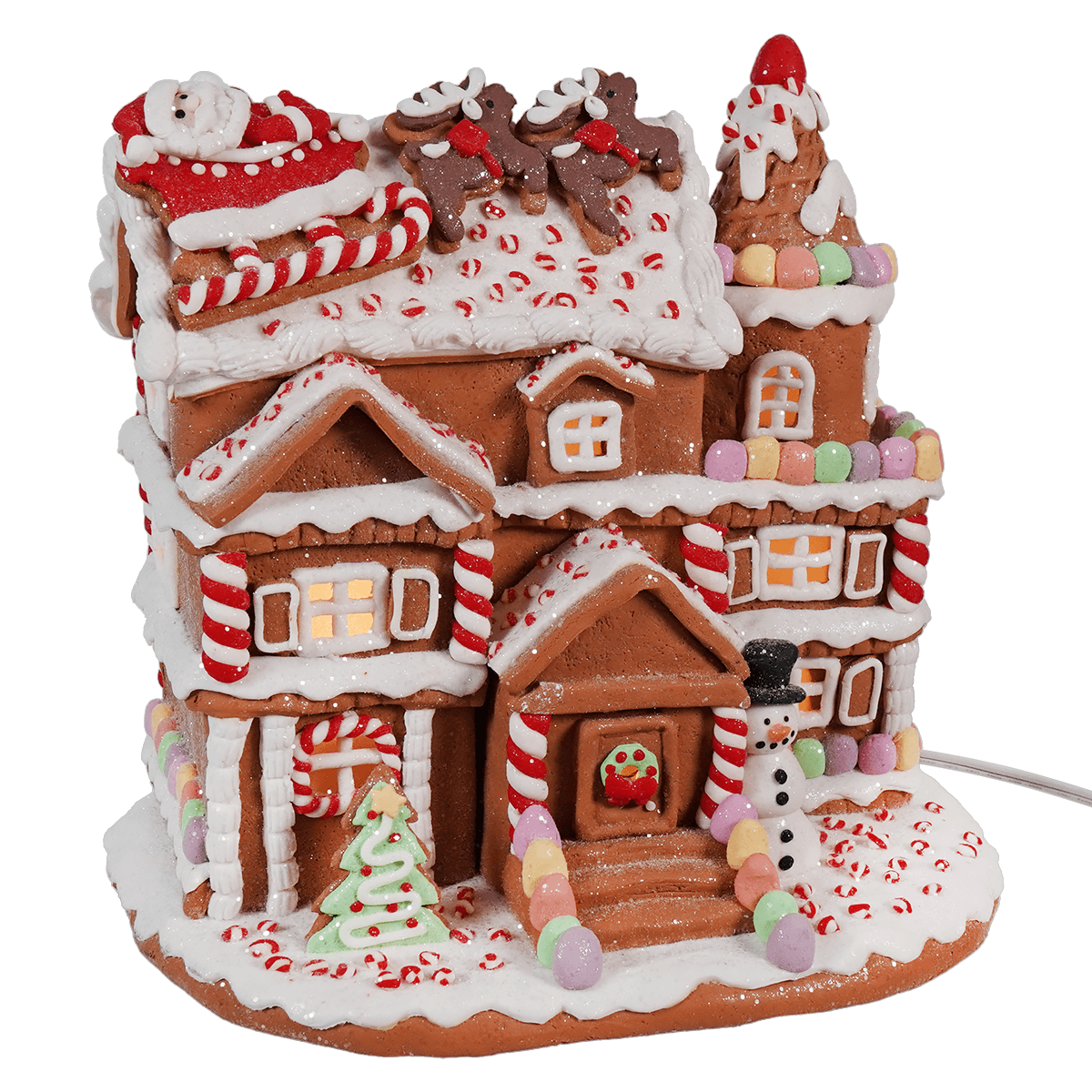 Decorative gingerbread house with candy and icing details.