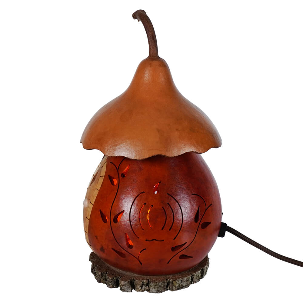 Rustic amber cottage gourd lamp with carved leaf pattern and natural stem by meadowbrooke gourds lighted harvest cottage