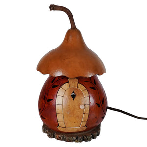 Hand-painted lighted harvest cottage gourd with a warm-toned body and brown textured roof by meadowbrooke gourds