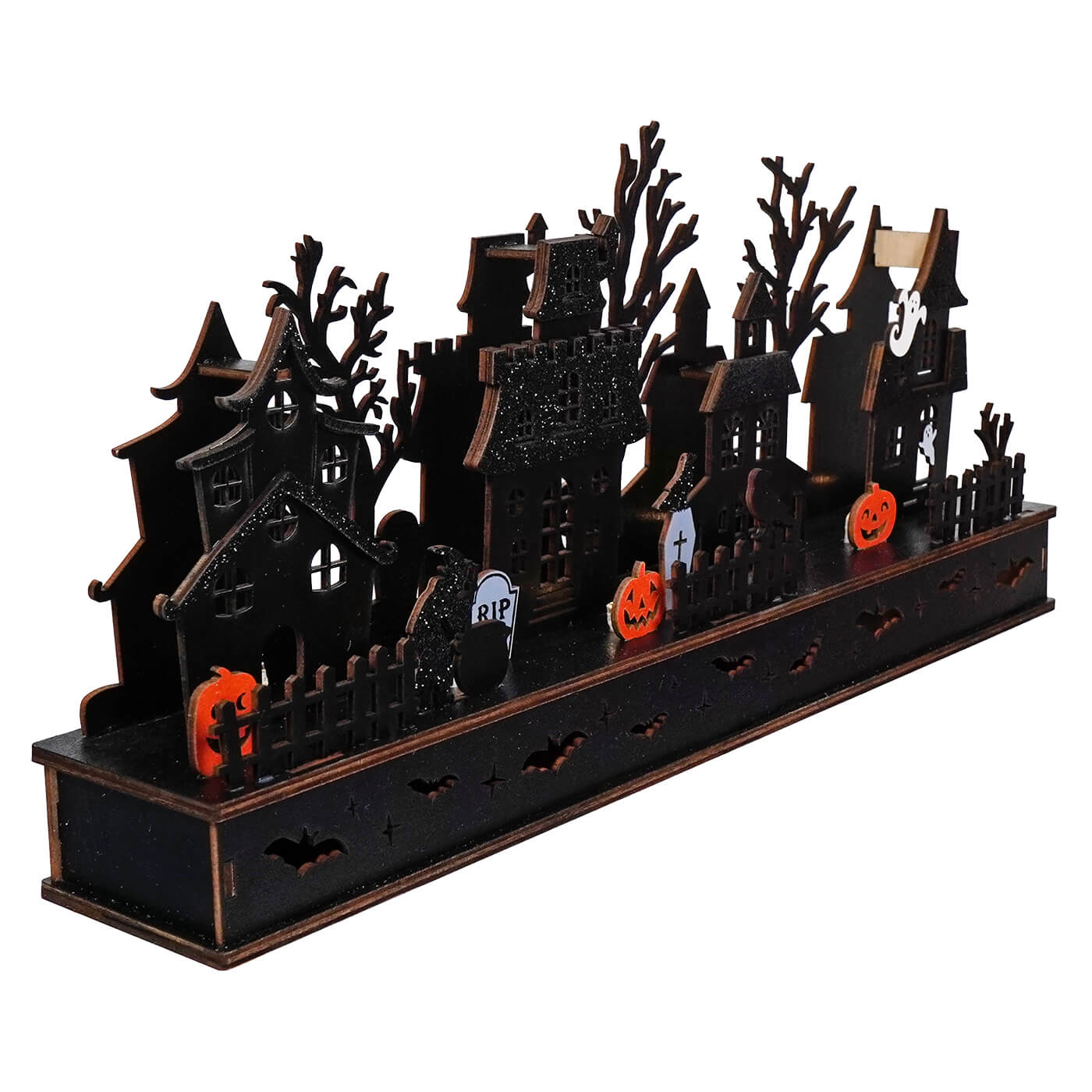 Halloween-themed decorative wooden village silhouette with spooky houses, trees, and pumpkins.