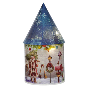 Blue house luminary with blue top features christmas lighted tabletop and hanging decor with santa scene and timer