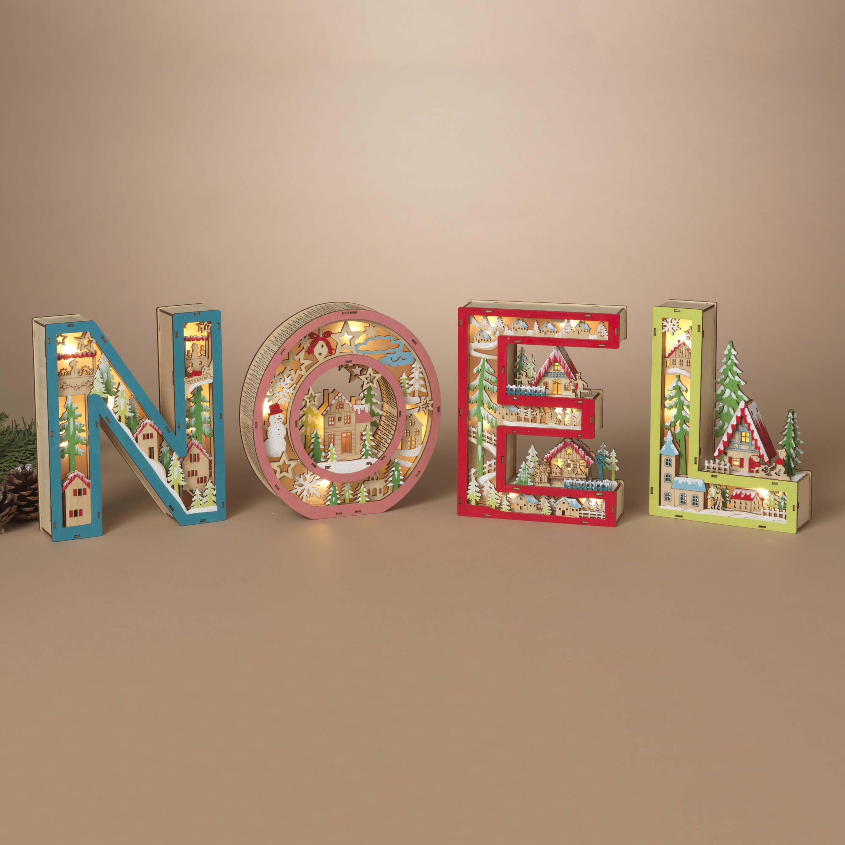 3d illuminated noel letters sign set in wood with multicolored holiday lights for christmas lighted tabletop decor