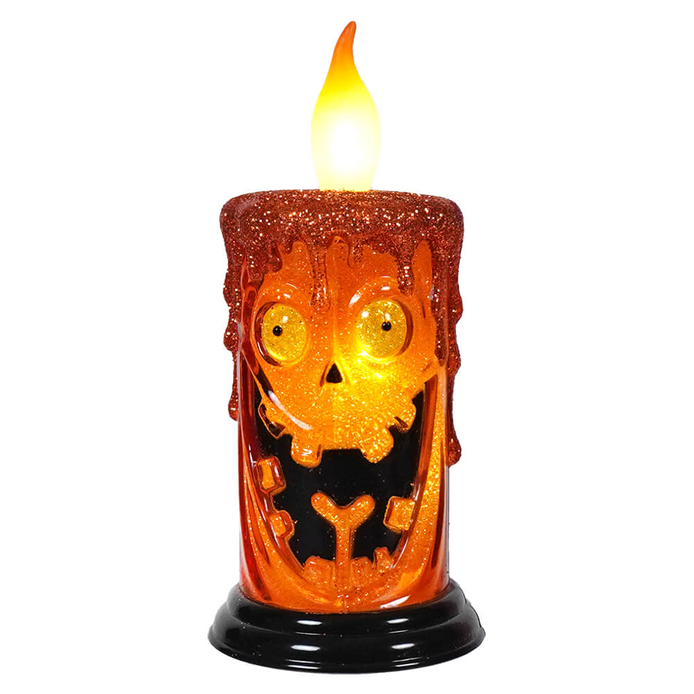 Halloween-themed electric candle with a glowing skull face design.