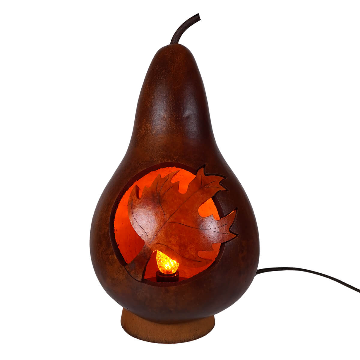 Lighted maple leaf silhouette gourd lamp with leaf cutout in warm glowing unique artisan piece design