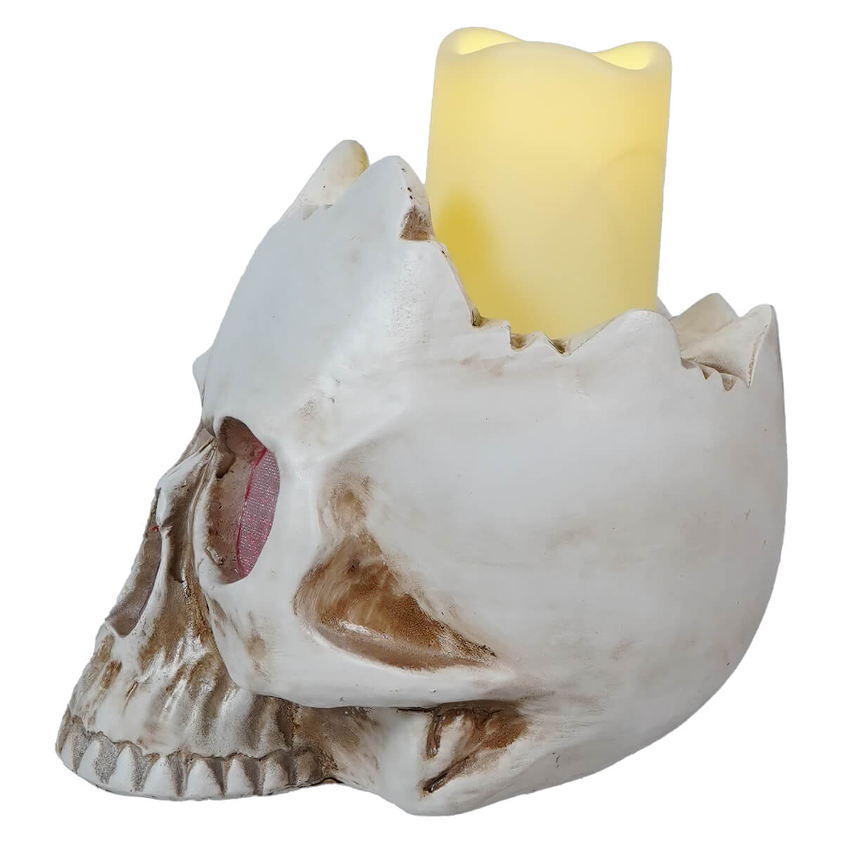 Human skull replica with a yellow candle placed on top of the cranium.