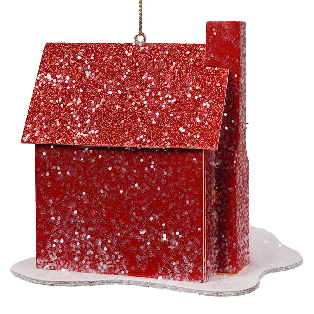 A festive red glittery house ornament with snow-dusted base from a green holiday lane lane house ornaments set
