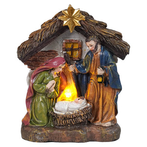 Lighted resin holy family manger scene with multicolored resin holy family figurines on wooden base and illuminated star